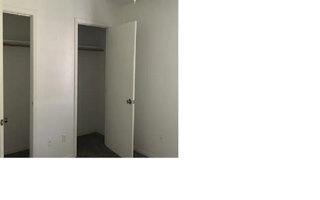 double clothes front bedroom - 10980 Forest Gln
