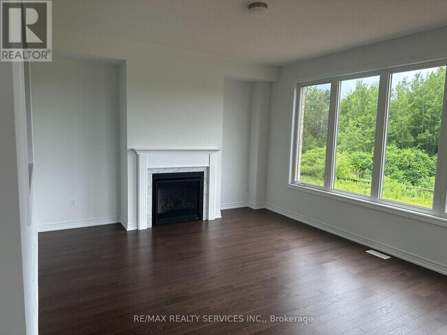 Photo du bâtiment - 136 Thicketwood Ave