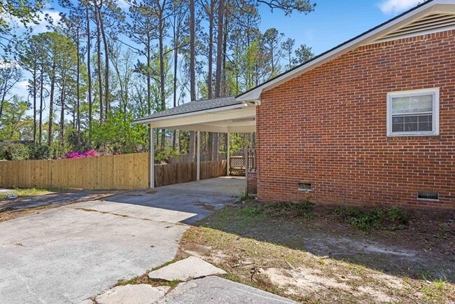 Building Photo - Spacious Brick Home with Modern Upgrades &...