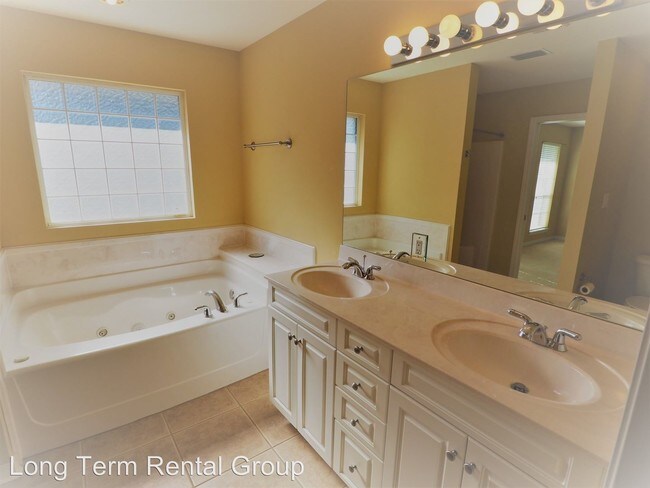 Building Photo - 4 br, 3 bath House - 7259 Raintree Lane