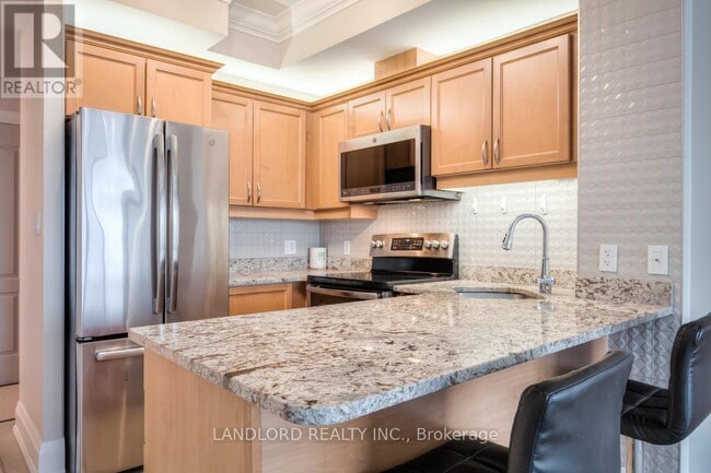 Photo du bâtiment - 3865-3865 Lake Shore Blvd W