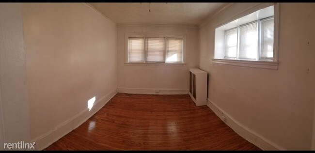 Building Photo - 1 br, 1 bath Apartment - 721 66TH A Unit A