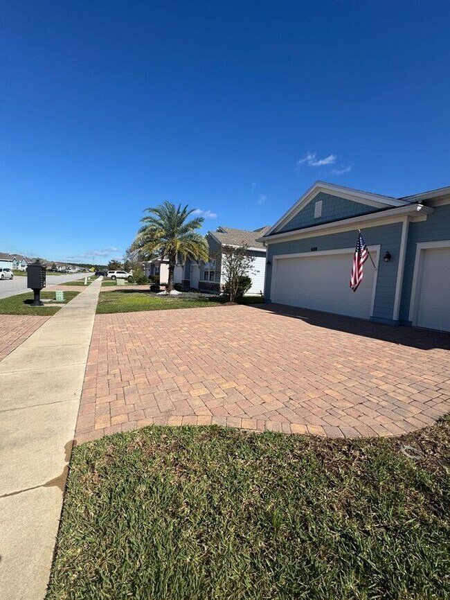 Foto del edificio - COMING SOON! Beautiful 4BR 3BA Home w/ Screened Lanai & Pond View • Garage Parking • Fenced Yard ...