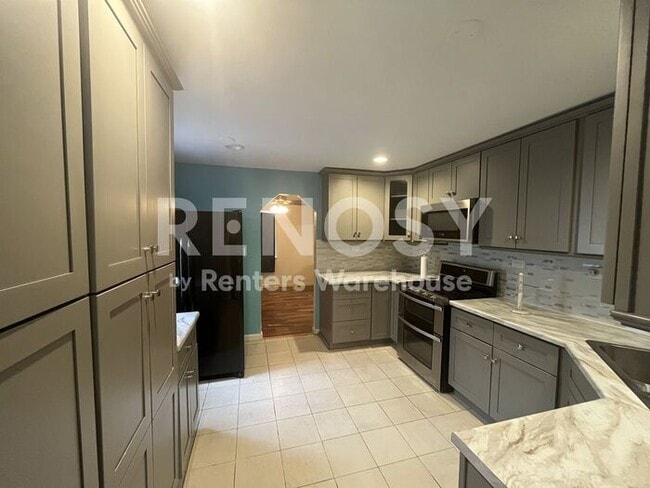 Photo - Charming 3-Bedroom Brick Home in North Park Hill – Spacious Yard & Finished Basement