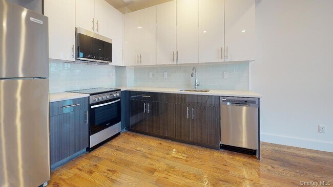 Building Photo - 138-28 Queens Blvd
