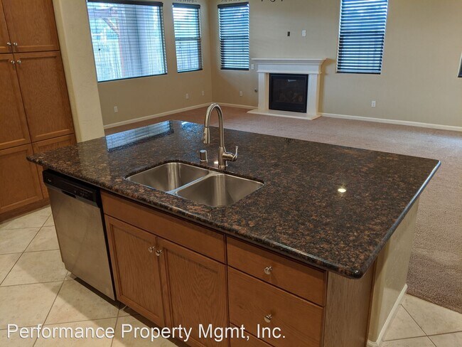 Building Photo - 4 br, 3 bath House - 7664 E. Giavanna Ave