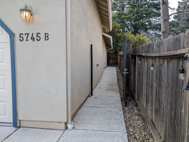 Private access to the home through a locking security gate - 5745 Mariposa Ave