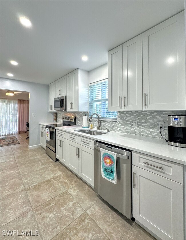 Building Photo - 6371 Pelican Bay Blvd