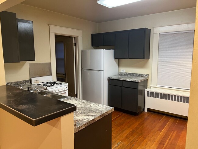 Building Photo - Available Immediately! Upgraded 2BR/1BA in...