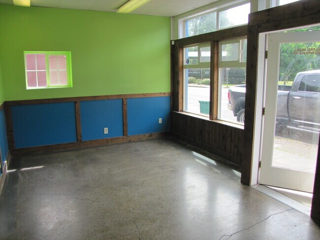 Front room looking at the left side. - 712 Bridge St