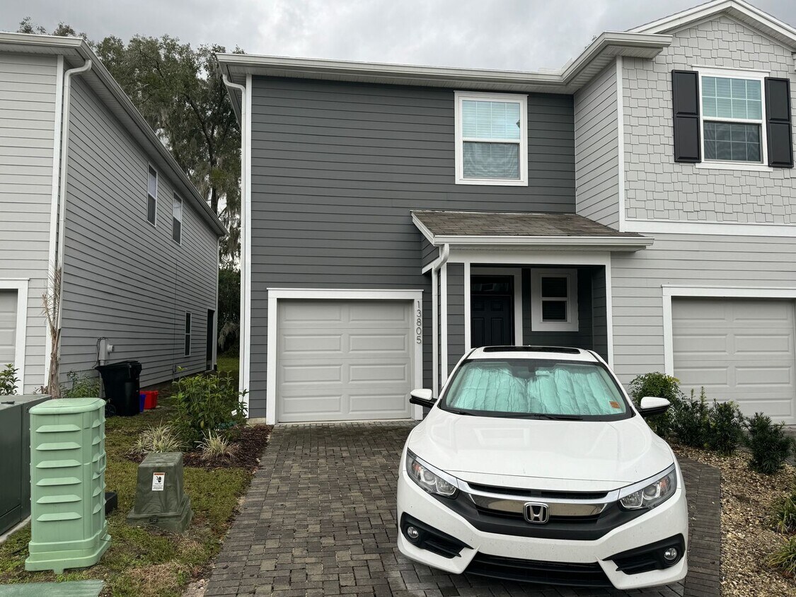 Primary Photo - Immaculate Tara Greens Townhome!