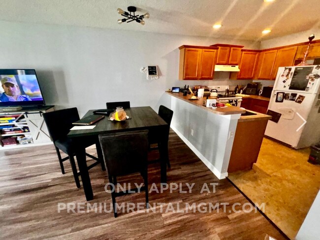 Photo - 3 bedroom 2.5 bath Oakcrest Townhome with Laminate and Tile flooring Throughout, and a 1 Car Garage!