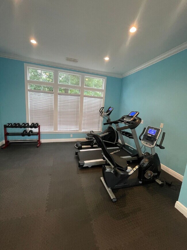 Building Photo - Spacious New 3BR/3BA Condos – Pool & Gym Amenities