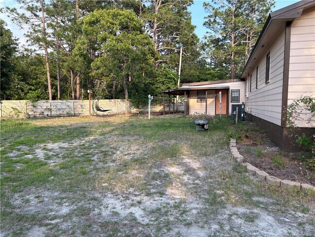 Foto del edificio - 6987 Pittman Grove Church Rd