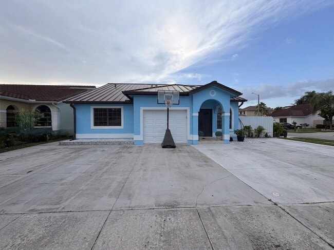 Photo - 14401 Southwest 114th Street, Miami, FL 33186 - 4 BR 3 BA single-family home