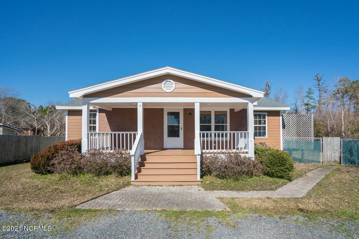Primary Photo - Southport Home With Fences In Yard