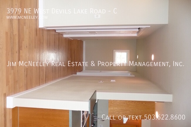 Building Photo - 3979 NE West Devils Lake Rd