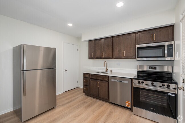 2 habitaciones, 1 baño - 945 pies cuadrados - Cocina - Pine Grove Townhomes