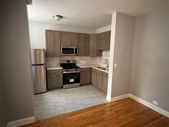 Unit 104 - 2358 E 70th Pl