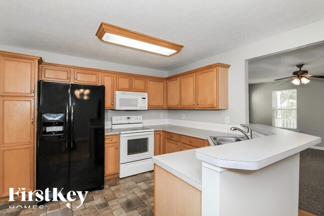 Building Photo - 6290 Dexters Dr