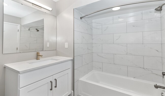 Renovated bathrooms with premium finishes are available for upgrade. Ask the leasing team for more details. - Locust on the Park