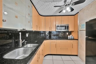 Building Photo - 6039 Collins Ave