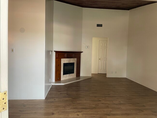 Living room with fireplace - 1023 N Rose St