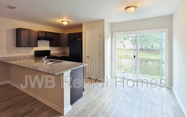 Building Photo - 7863 Playschool Ln