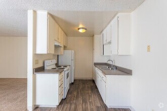 2 BR, 2 BA - 975 SF - Palms Apartments