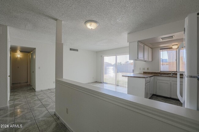 Building Photo - 3020 N 87th Ave