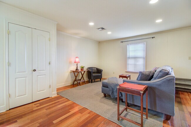 LIVING ROOM WITH STORAGE CLOSET - 3104 Veterans Memorial Dr