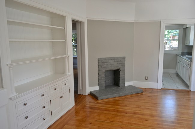 Decorative fireplace and built-ins in living room - 568 Merrimac St