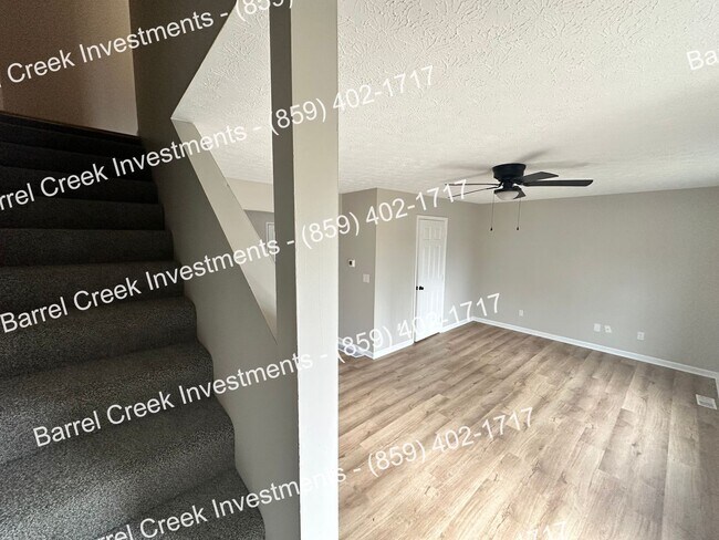 Foto del edificio - 2-Bed, 1-Bath Townhome with Attached Garag...