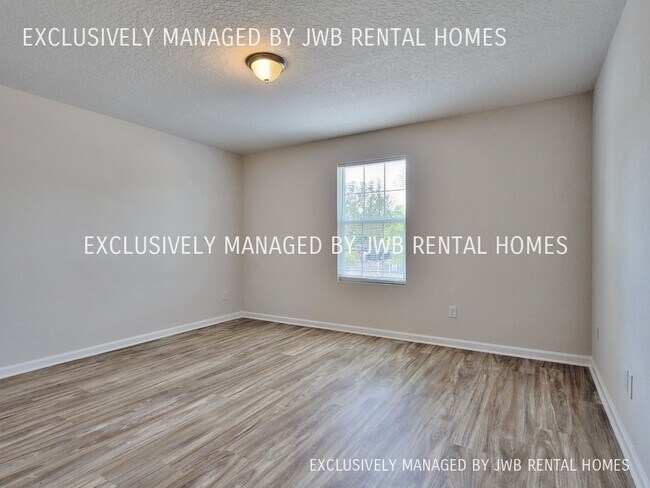 Building Photo - 8486 McGirts Village Ln