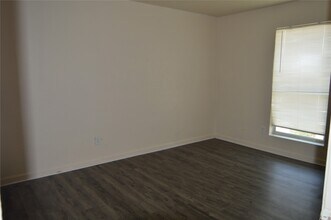 Building Photo - 8100 Creekbend Dr