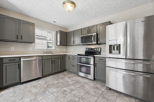 Photo - Welcoming 4-bed, 2.5-bath home in Durham offers thoughtful touches throughout.