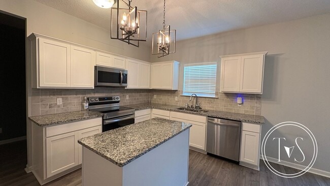 Building Photo - SUMMER MOVE-IN SPECIAL AND RATE DROP ALERT...