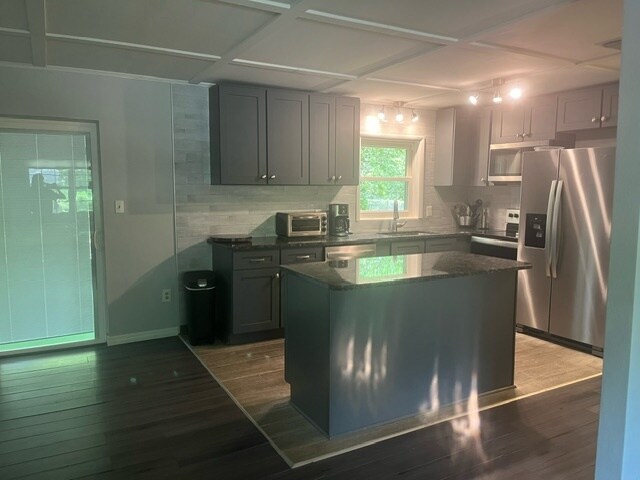 Kitchen and Dining Area - 905 NW 39th Dr