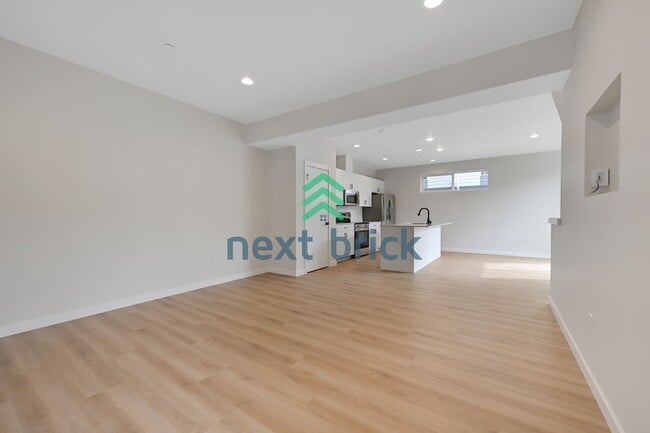 Building Photo - Brand-New 2026 Townhome | 3 Bed | 2.5 Bath | 1,560 Sq Ft | EV Garage | A/C Included