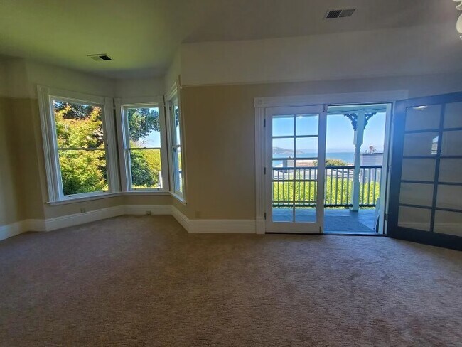 Beautiful luscious views of foliage greenery & the Bay water, from any area of the Living & Dining - 31 Princess Ln