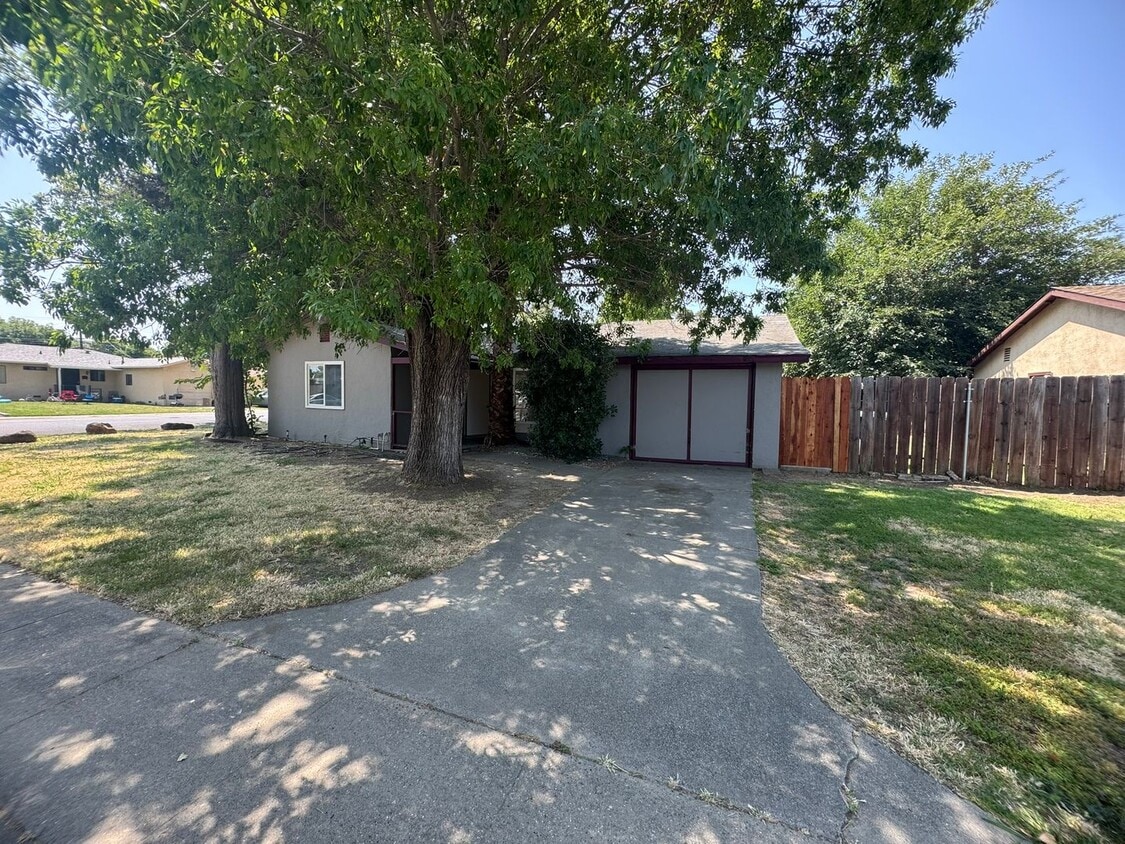 Primary Photo - Updated Three Bedroom Corner Lot Home