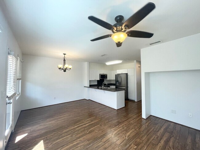 Building Photo - 3 BD/ 3 BA Townhome W/ Solar- Available no...
