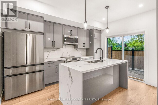 Photo du bâtiment - 4 Alderwood Ln