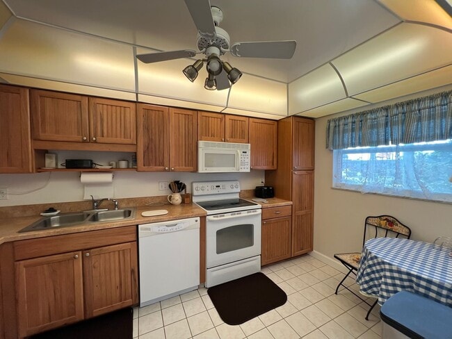 Building Photo - *55+ Community* 2nd floor furnished Condo