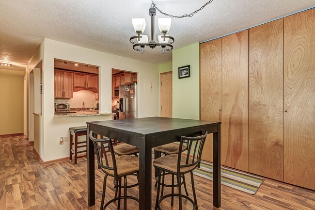 Dining Room into kitchen - 4860 Park Commons Dr