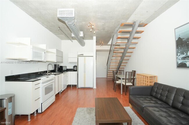 Foto del edificio - 1 br, 1.5 bath Condo - 690 SW 1st Ct Apt 1209
