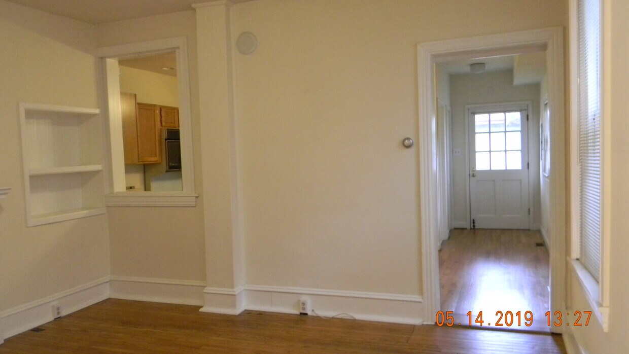 Living room toward rear entry - 315 1/2 Dean St