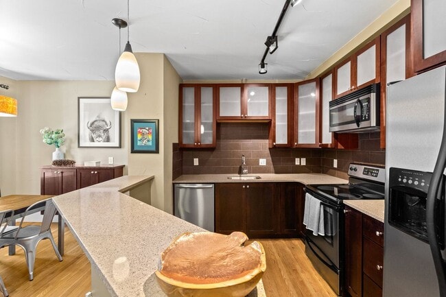 Building Photo - Stunning Industrial-Chic Loft in the Heart of Capitol Hill