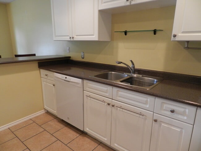 Loads of countertop and cupboard space! - 710 Massie Dr