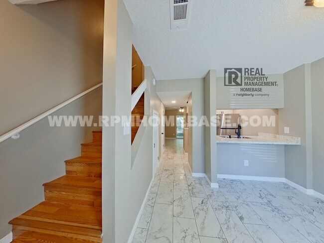 Building Photo - Updated Spanish Trail Townhome | 2BR/1.5BA | Fenced Yard | Near UWF & Hospital